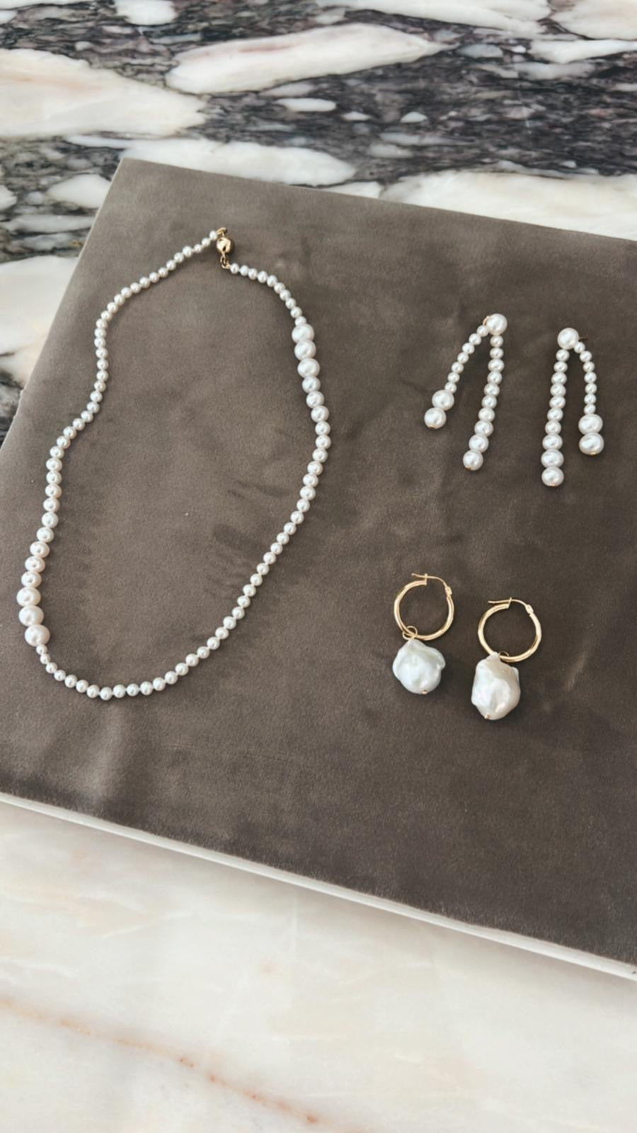 Understanding Different Types of Pearls: Natural, Freshwater, Akoya, Baroque, and Fake Pearls